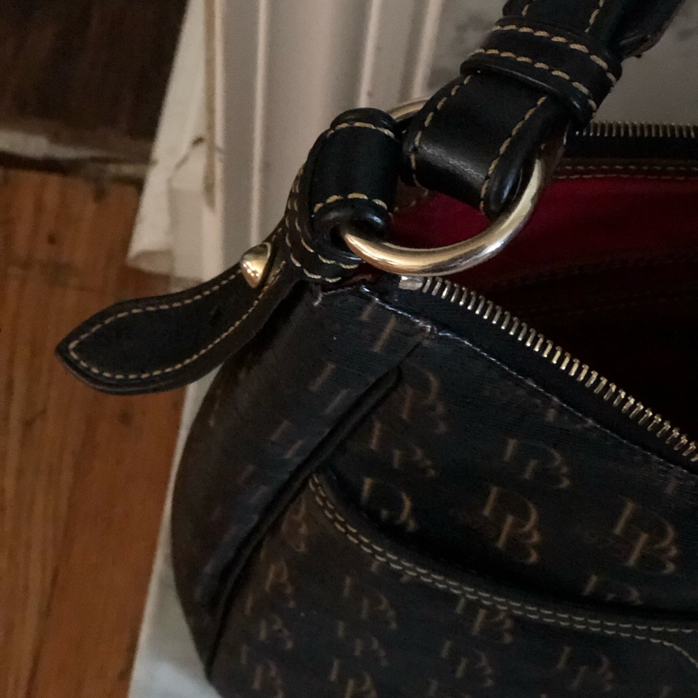 Authentic Dooney & Bourke 1975 hand bag.